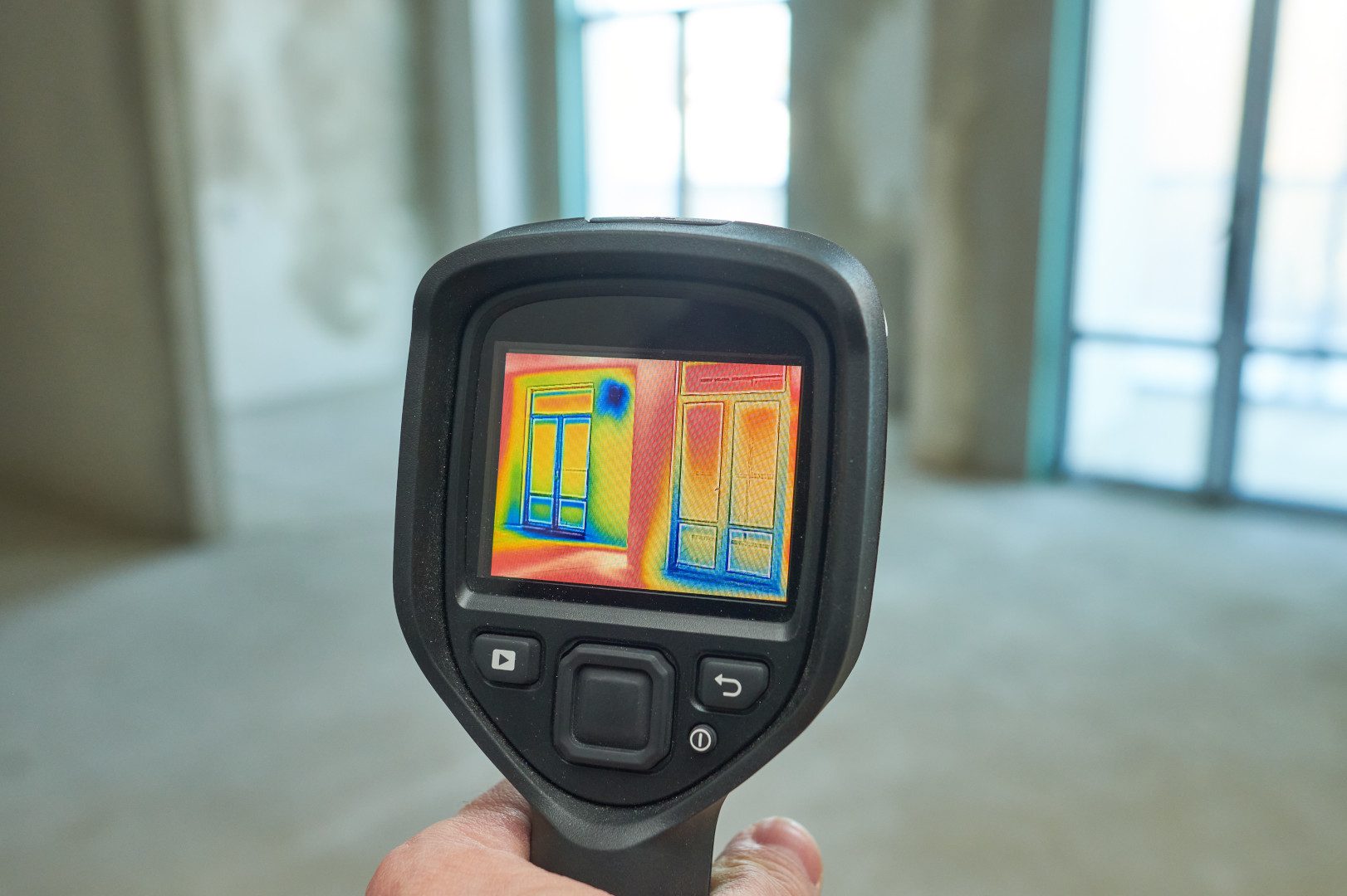 thermal imaging camera inspection of window building. check heat loss
